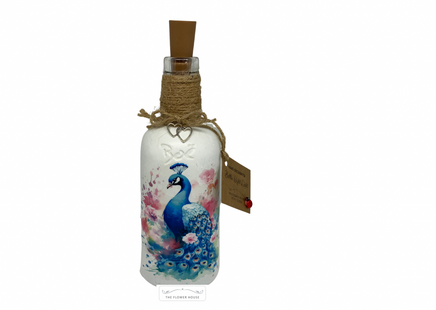 Decoupaged Light Up Bottle With A Variety Of Different Designs